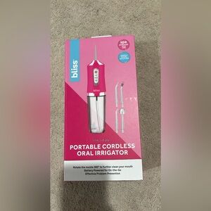 Bliss oral irrigator